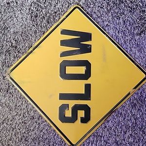 "SLOW" Metal Wall Sign